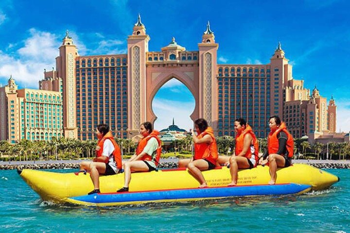 Glide across Dubai's beautiful waters on a banana boat surrounded by stunning skyline views and laughter with family or friends. An ideal escape for unforgettable seaside fun.